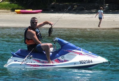 A registered jetski with its unique number prominently and clearly displayed.